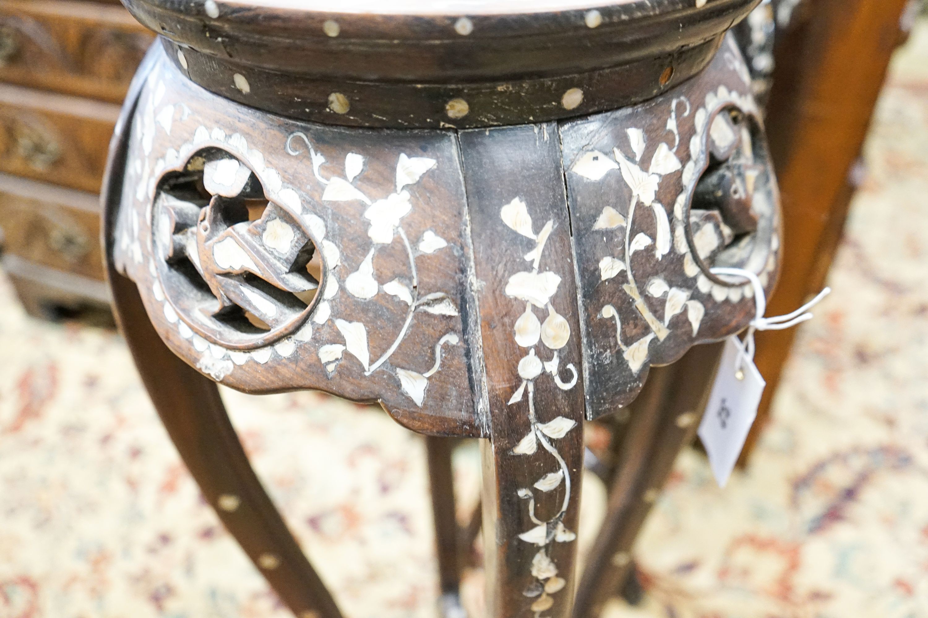 A pair of Chinese mother of pearl inset hardwood vase stands, height 92cm